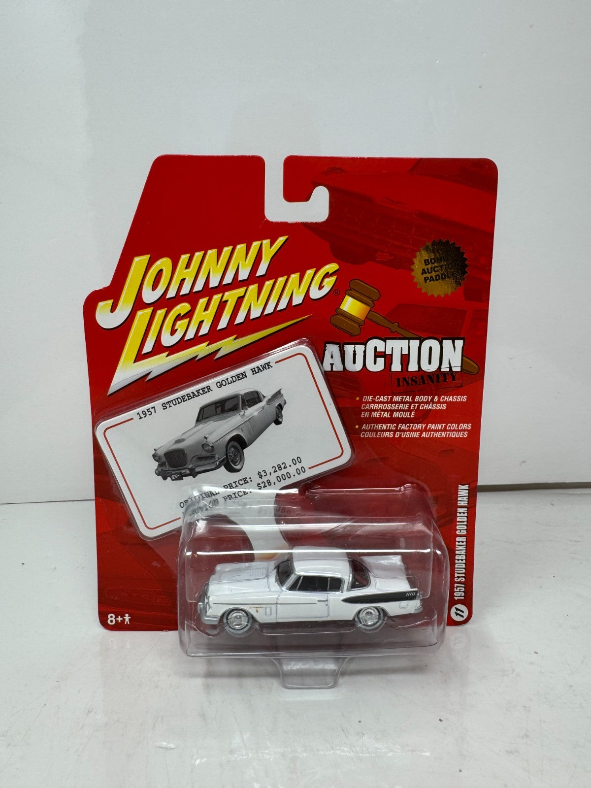 Johnny Lightning Auction Insanity 1957 Studebaker Golden Hawk 1:64 Diecast