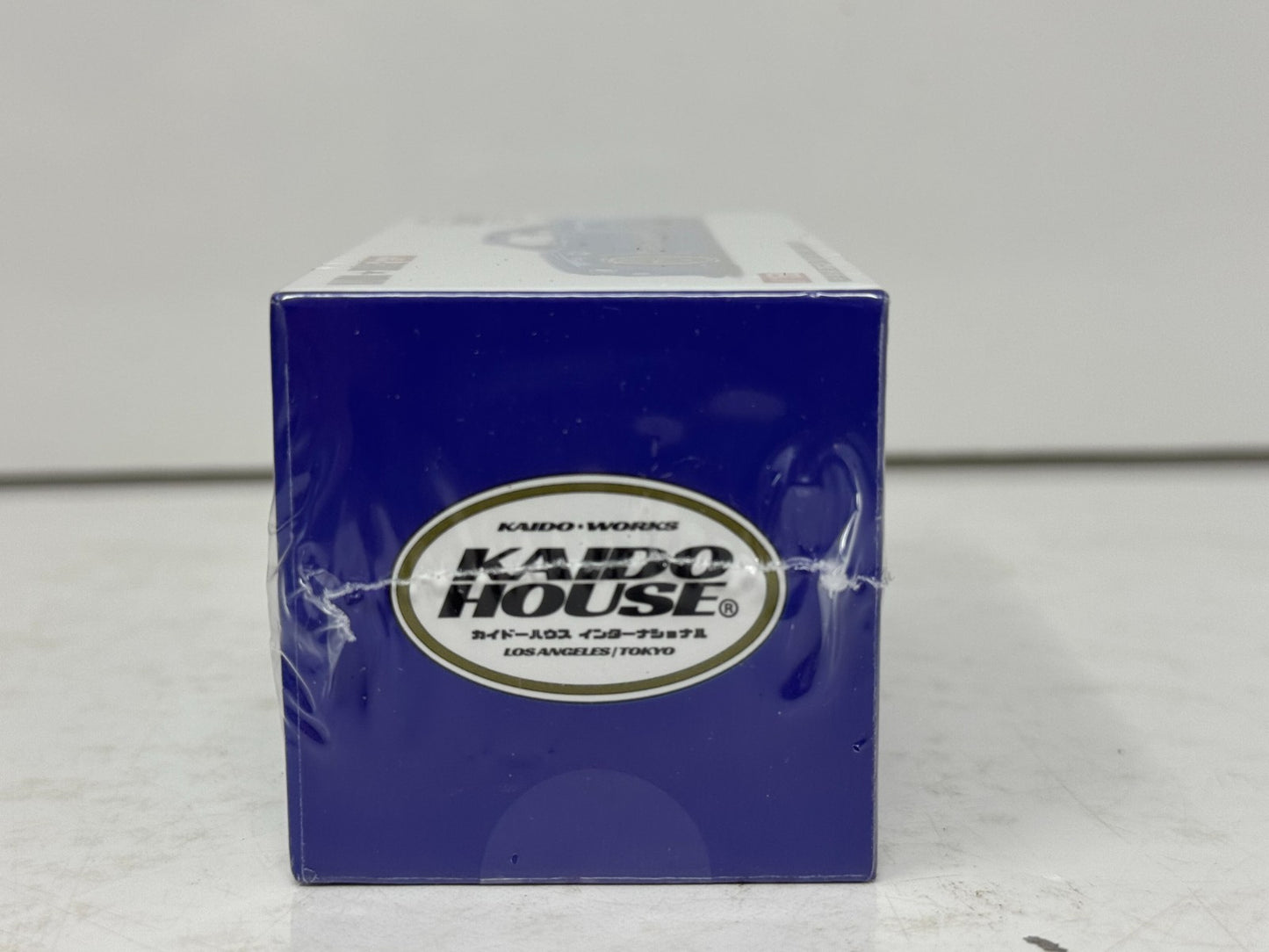Kaido House Nissan Skyline GT-R (R34) Kaido Works Shinjuku V2 1:64 Diecast