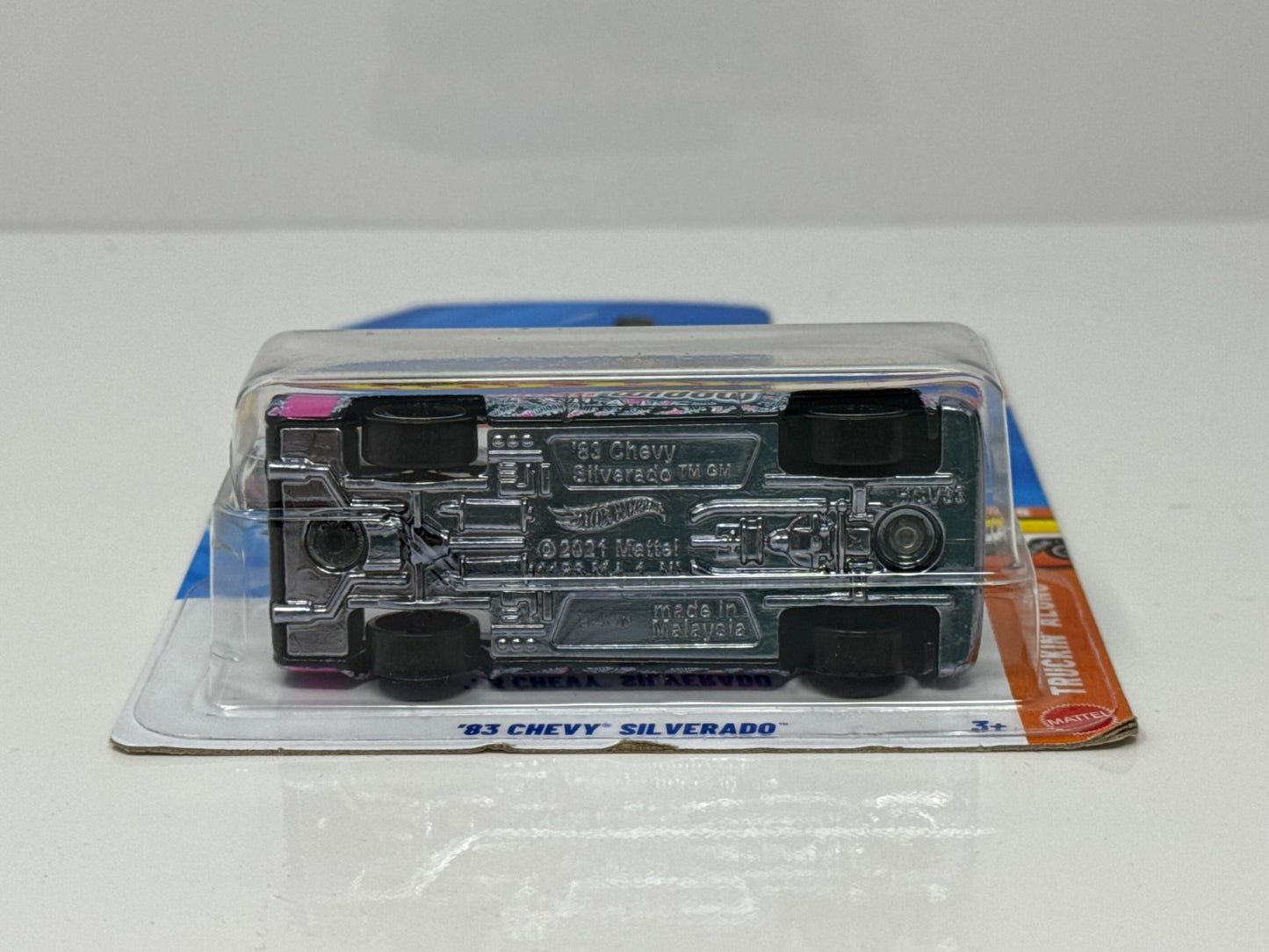 Hot Wheels Truckin’ Along 1983 Chevy Silverado Black Widow 1:64 Diecast