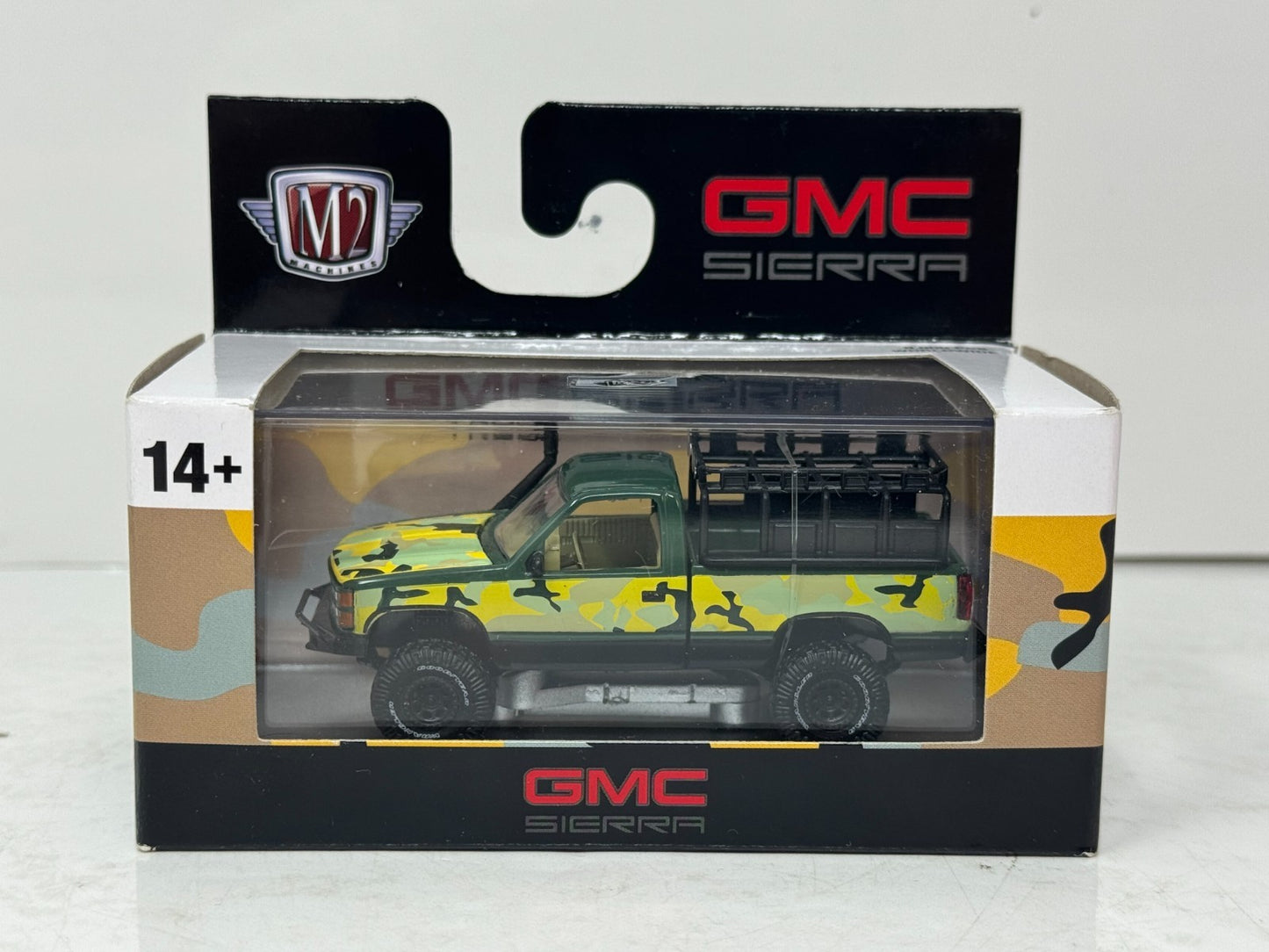 M2 Machines 1988 GMC Sierra Grande 1500 4x4 Camo Edition 1:64 Diecast