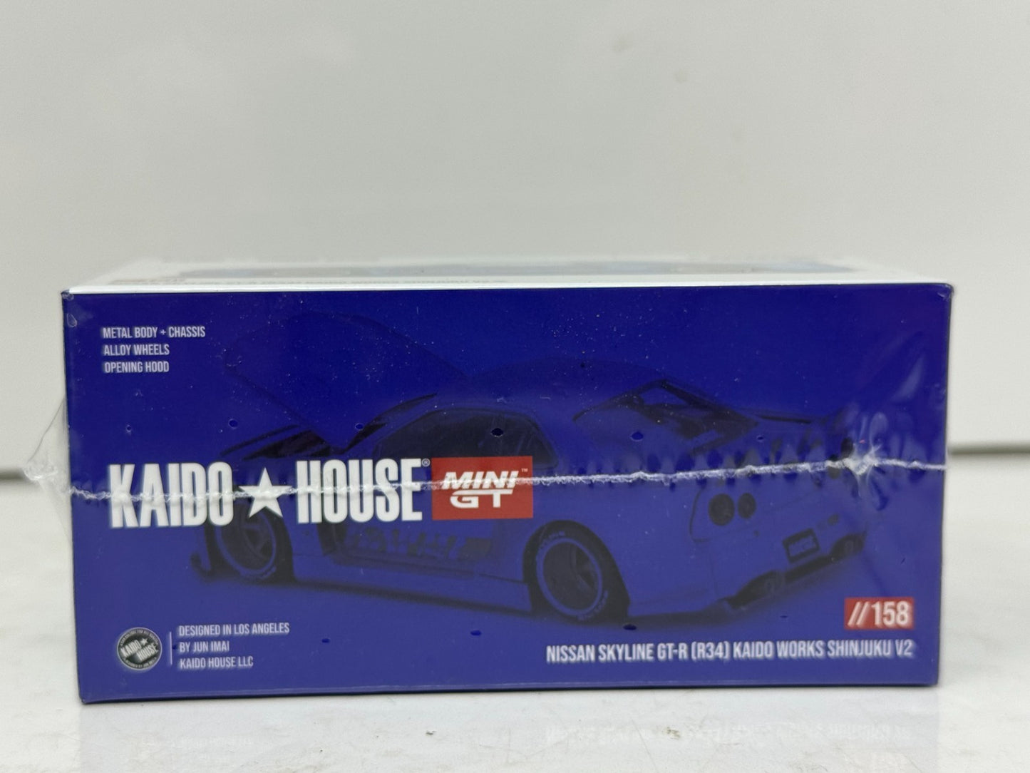 Kaido House Nissan Skyline GT-R (R34) Kaido Works Shinjuku V2 1:64 Diecast