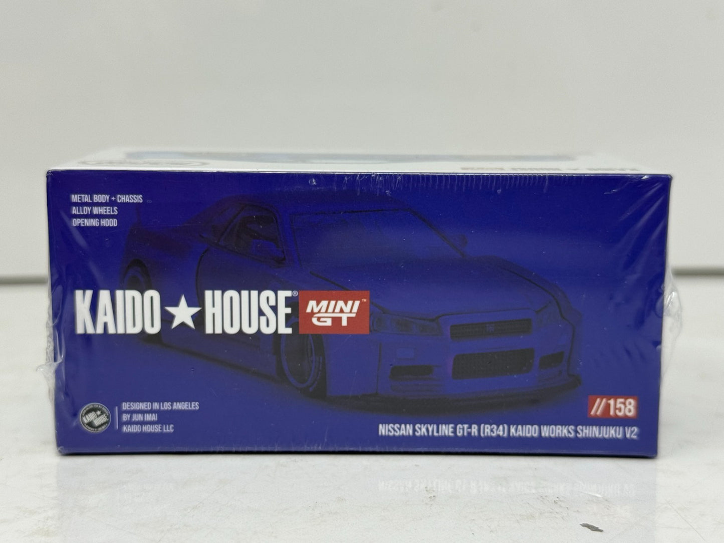 Kaido House Nissan Skyline GT-R (R34) Kaido Works Shinjuku V2 1:64 Diecast