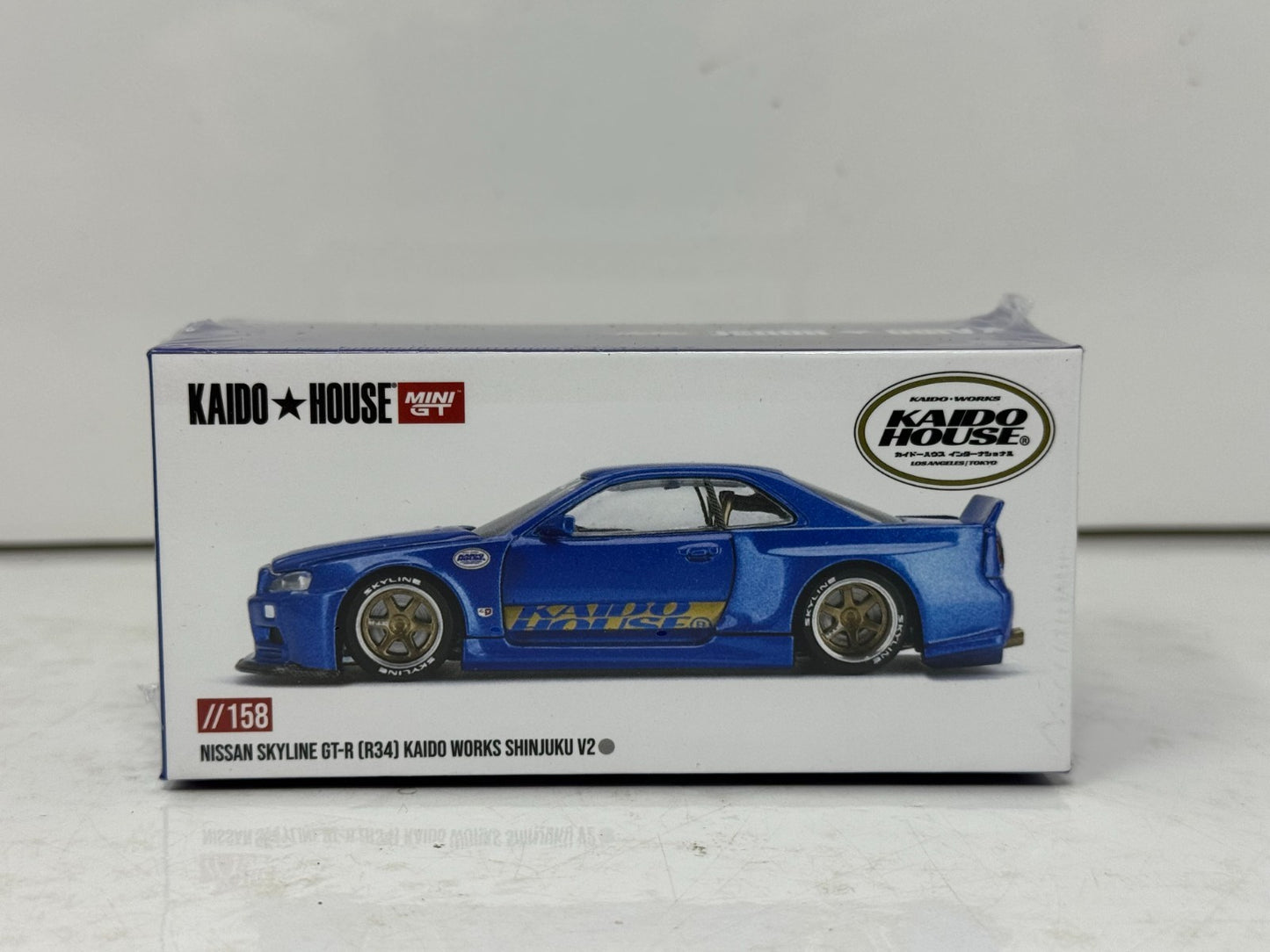 Kaido House Nissan Skyline GT-R (R34) Kaido Works Shinjuku V2 1:64 Diecast