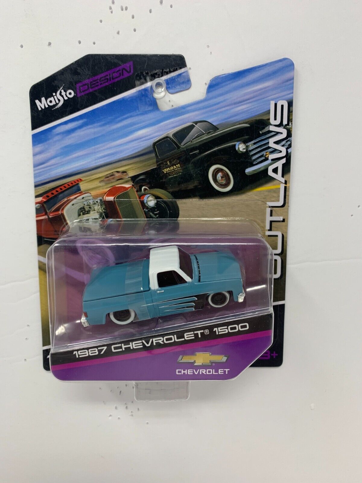 Maisto Design Outlaws 1987 Chevrolet 1500 1:64 Diecast