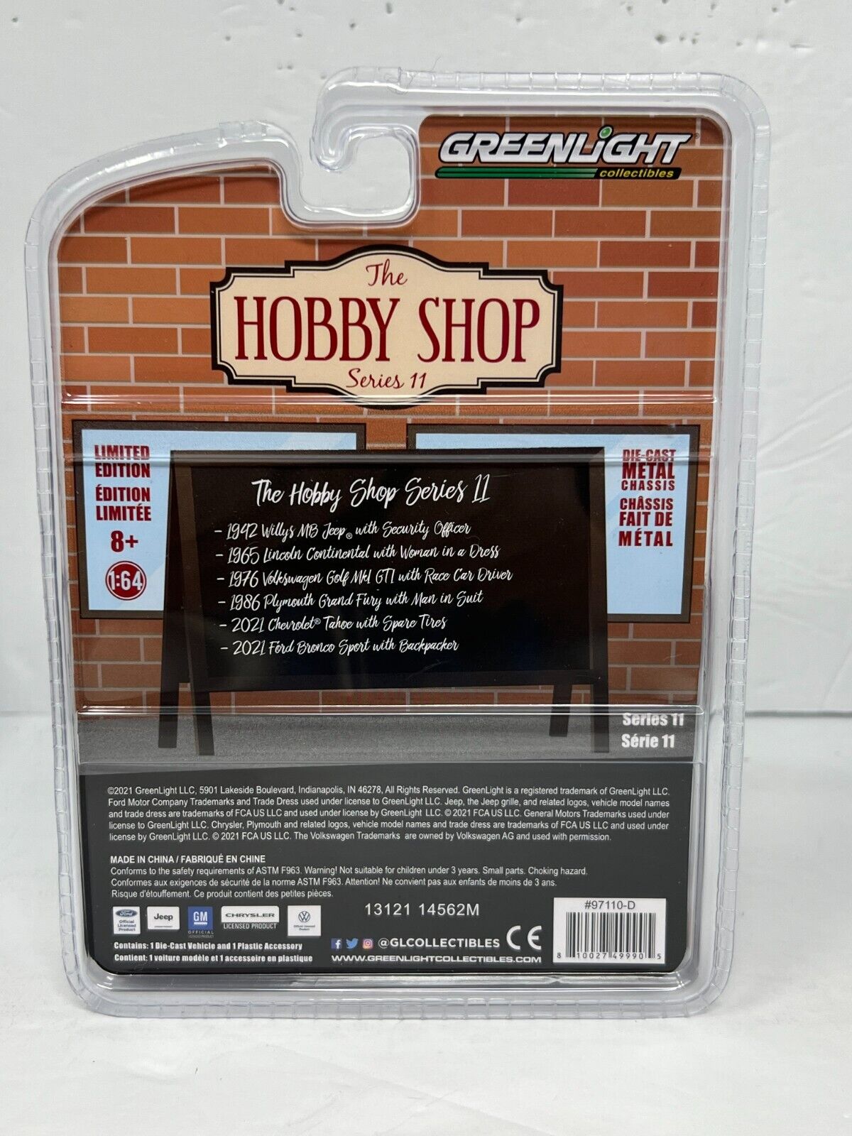 Greenlight The Hobby Shop 1986 Plymouth Grand Fury with Man in Suit 1:64 Diecast