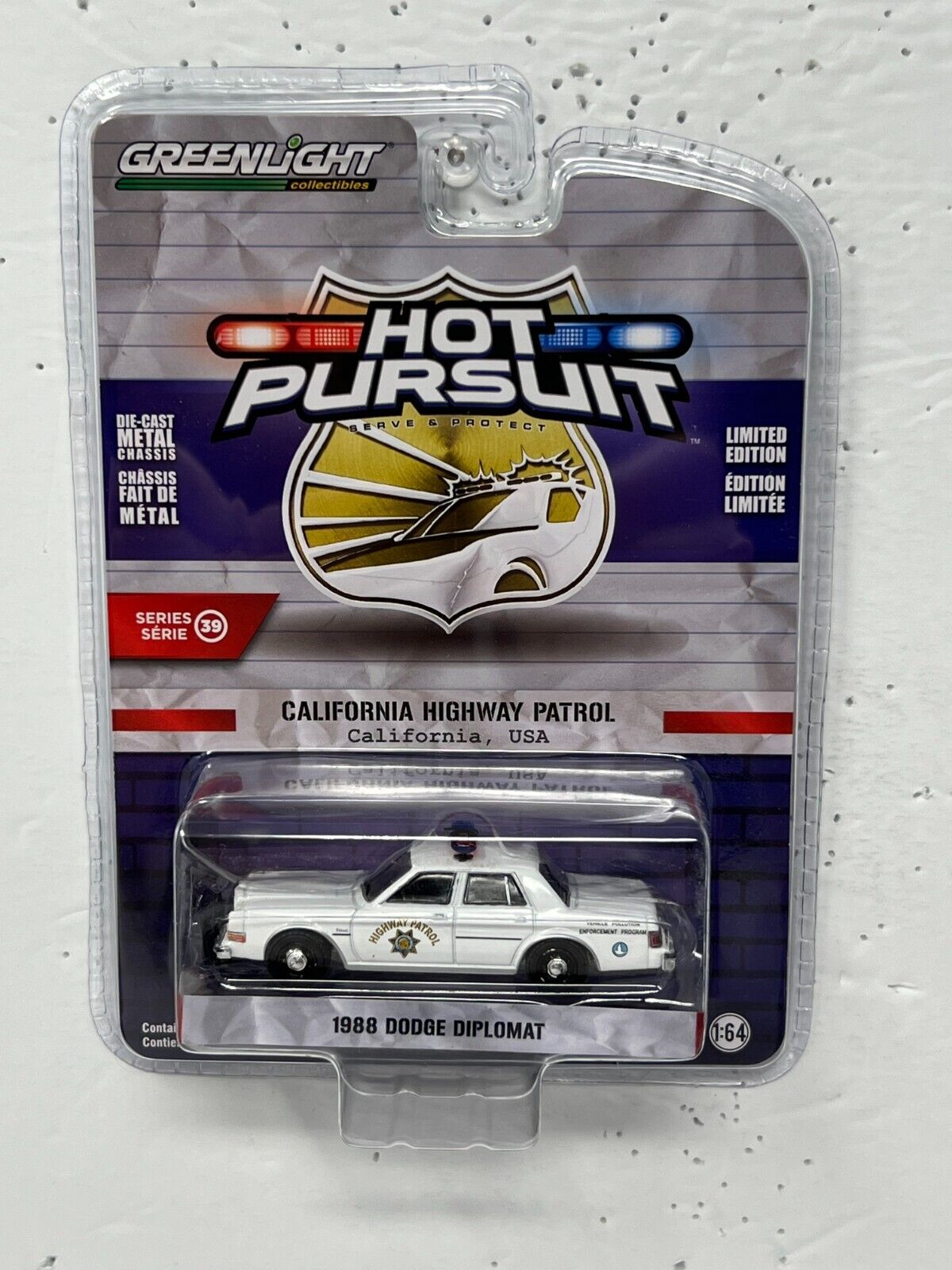 Greenlight Hot Pursuit 1988 Dodge Diplomat 1:64 Diecast