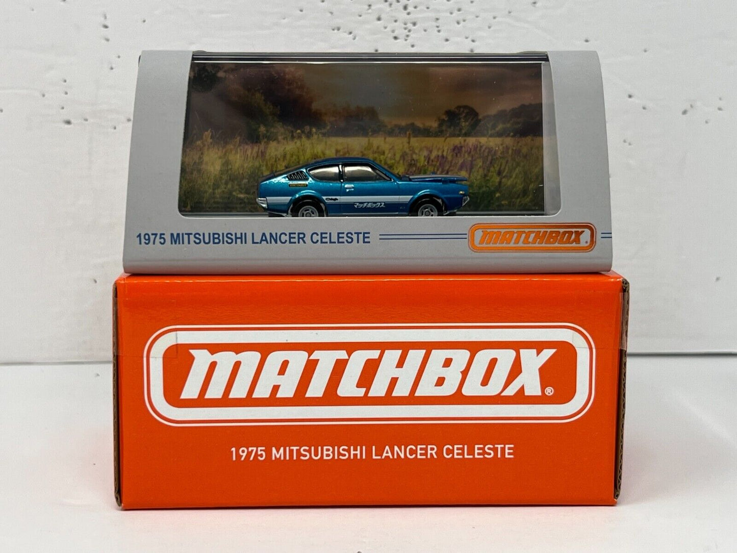 Matchbox 1975 Mitsubishi Lancer Celeste Mattel Creations 1:64 Diecast