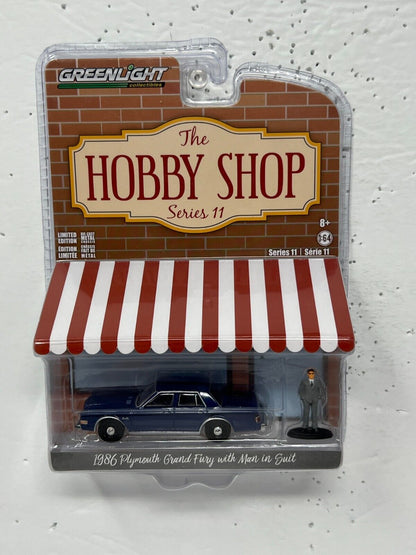 Greenlight Hobby Shop 1986 Plymouth Grand Fury with Man in Suit 1:64 Diecast V2