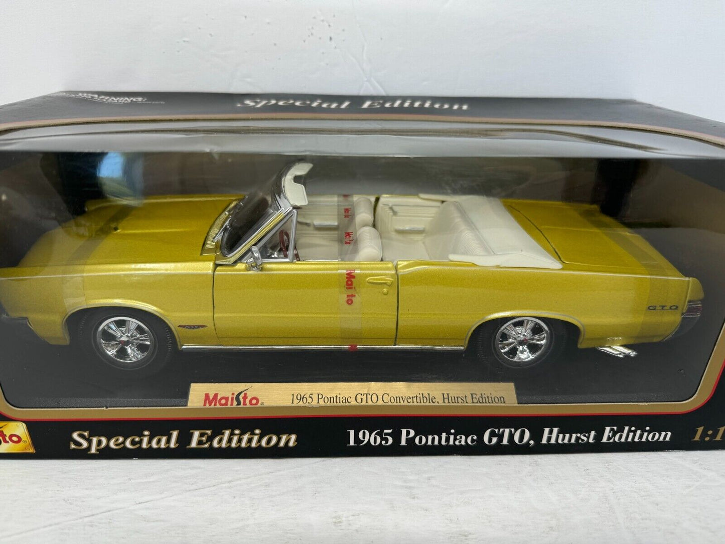 Maisto 1965 Pontiac GTO Hurst Special Edition 1:18 Diecast Gold Color