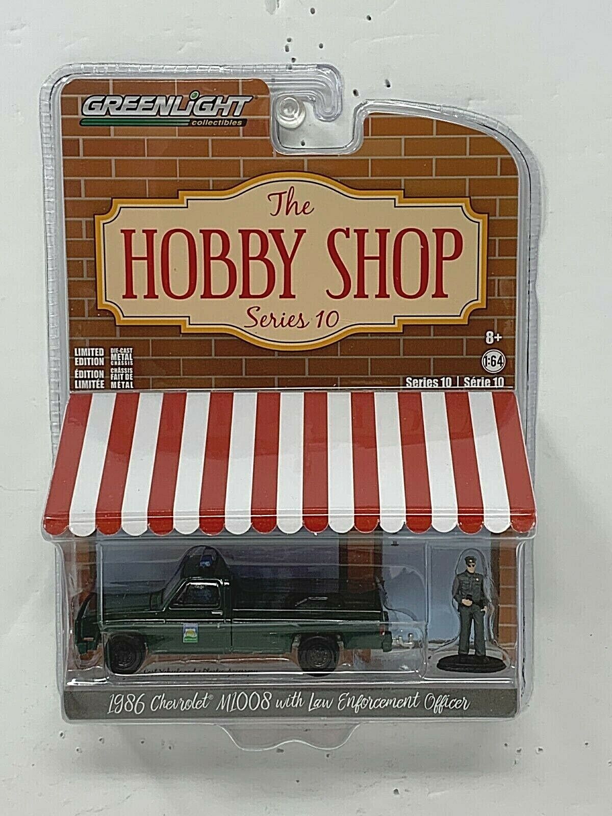 Greenlight 1986 Chevrolet M1008 The Hobby Shop (Series 10) 1:64 Diecast