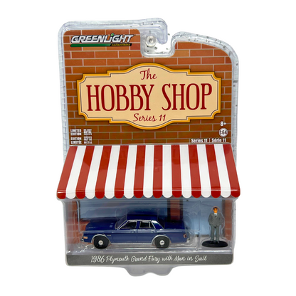 Greenlight The Hobby Shop 1986 Plymouth Grand Fury with Man in Suit 1:64 Diecast