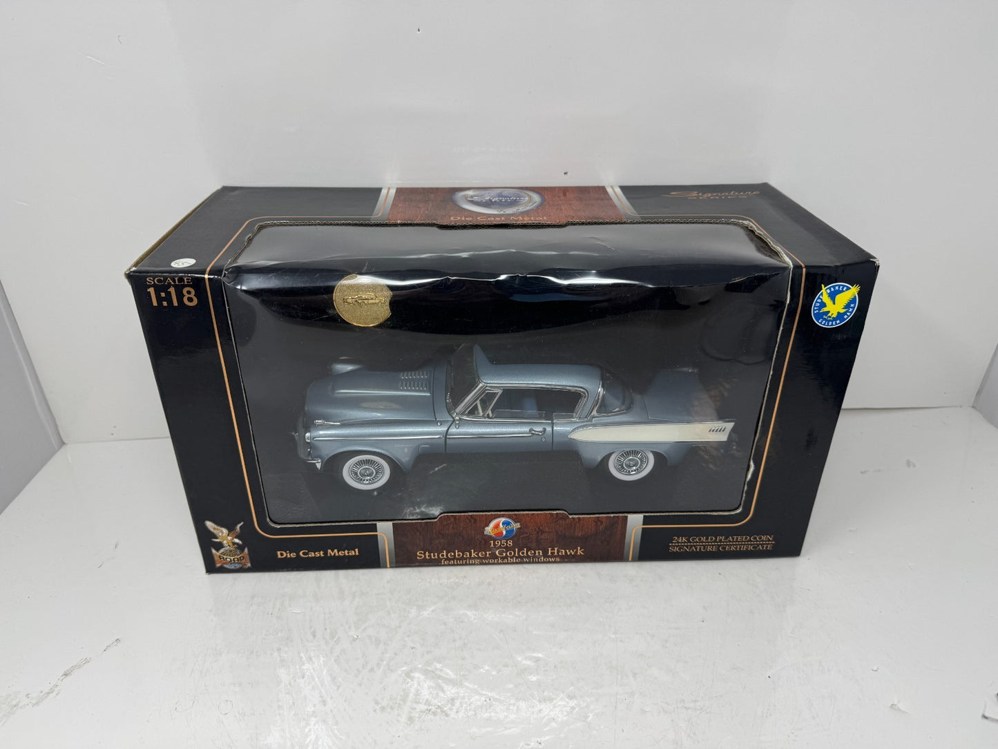Yat Ming Road Signature 1958 Studebaker Golden Hawk 1:18 Diecast Coin Edition