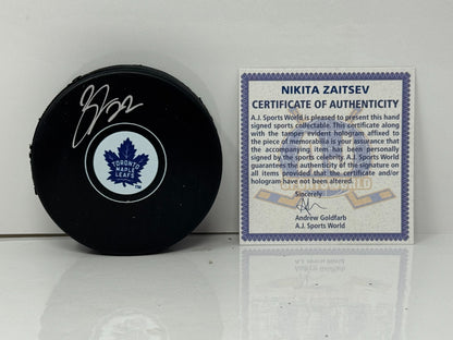 Nikita Zaitsev Toronto Maple Leafs Signed NHL Autograph Puck Silver Auto