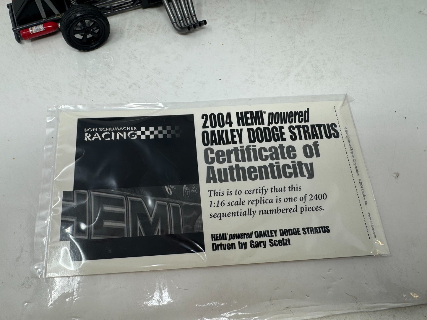 Milestone Gary Scelzi NHRA HEMI Powered Oakley Dodge Stratus Funny Car 116 Scale