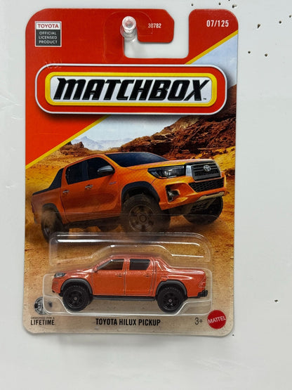 Matchbox Toyota Hilux Pickup 1:64 Diecast Orange