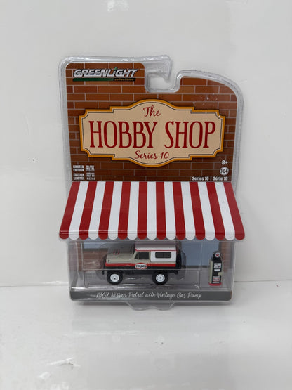 Greenlight The Hobby Shop 1967 Nissan Patrol with Vintage Gas Pump 1:64 Diecast