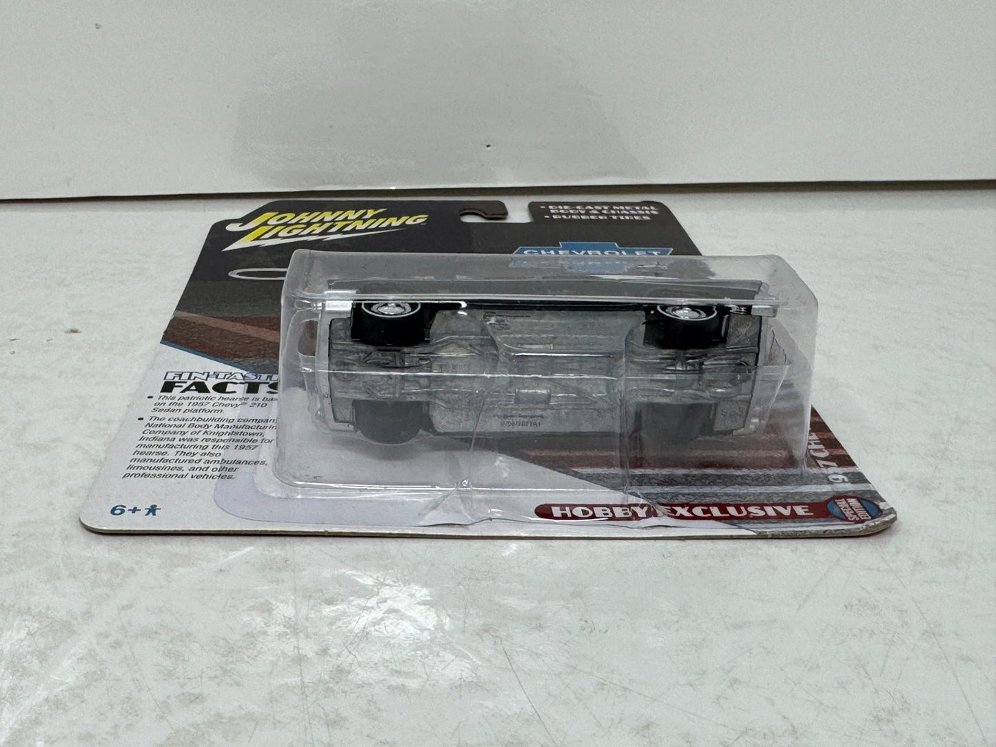 Johnny Lightning Chevrolet 1957 Chevy Hearse Black 1:64 Diecast