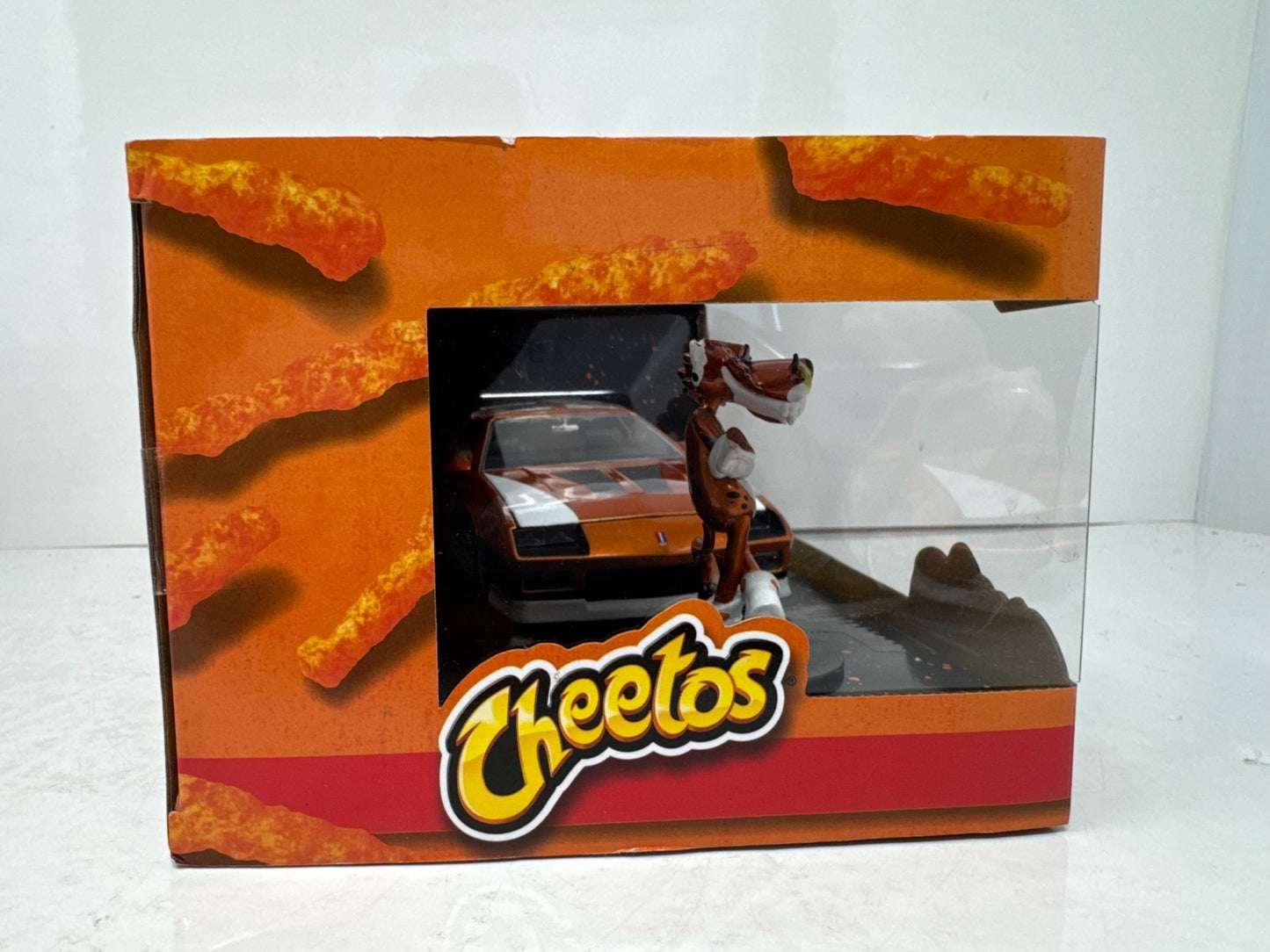 Jada Cheetos 1985 Chevy Camaro Z28 IROC 1:24 Diecast with Chester Cheetah Figure