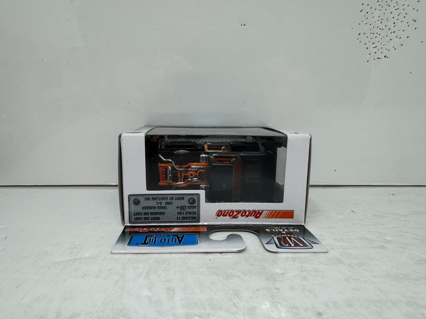 M2 Machines Auto Zone 1979 Chevrolet Silverado Lift 2-Pack 1:64 Diecast