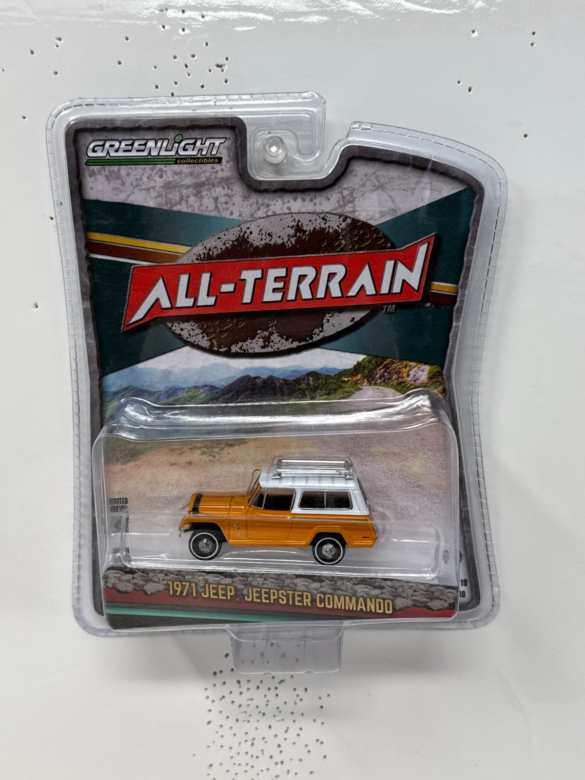 Greenlight All-Terrain 1971 Jeep Jeepster Commando 1:64 Diecast