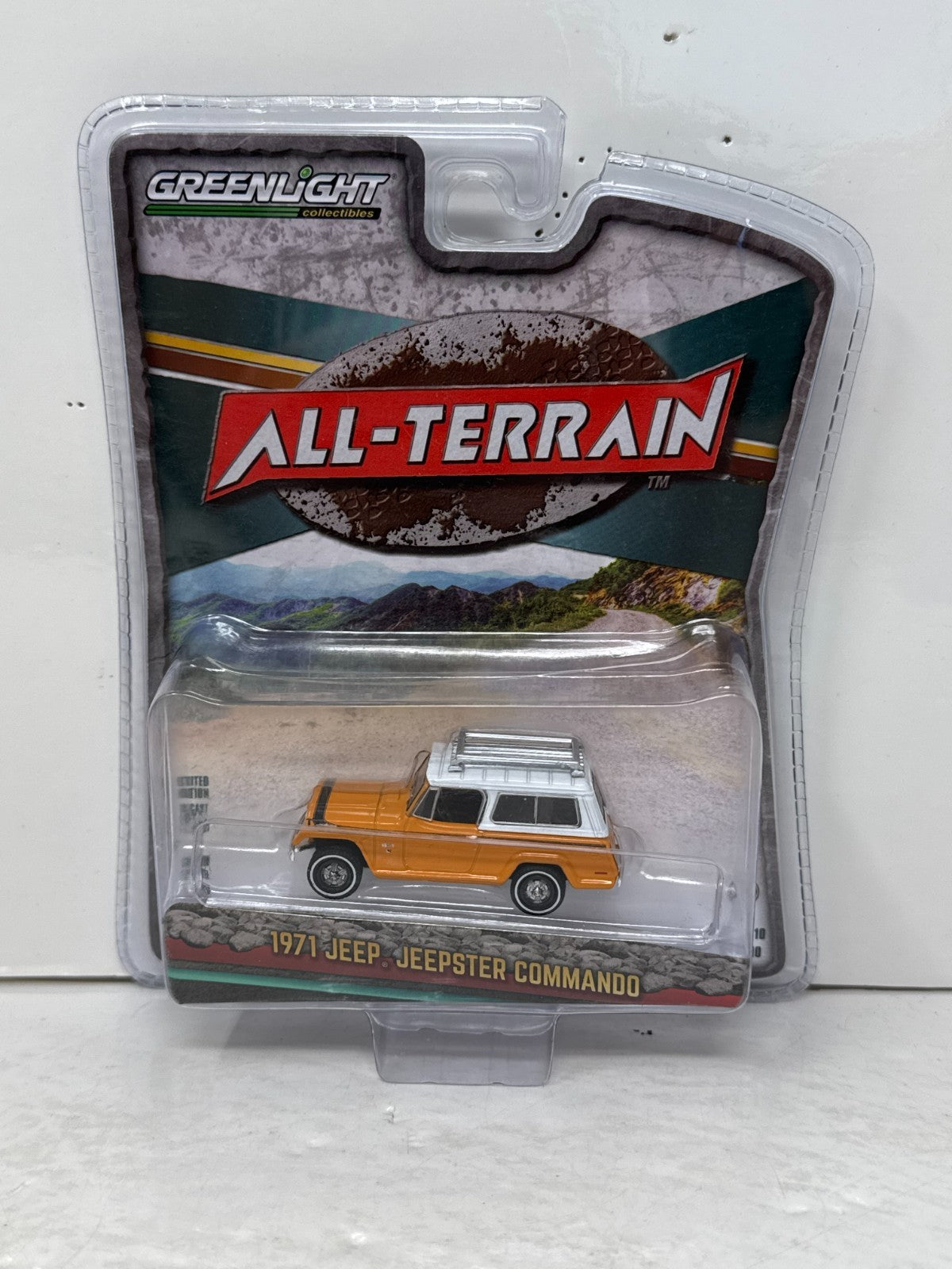 Greenlight All-Terrain 1971 Jeep Jeepster Commando 1:64 Diecast