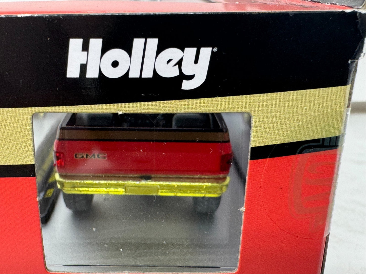 M2 Machines Holley 1976 GMC Sierra Grande 15 4x4 CHASE 1:64 Diecast