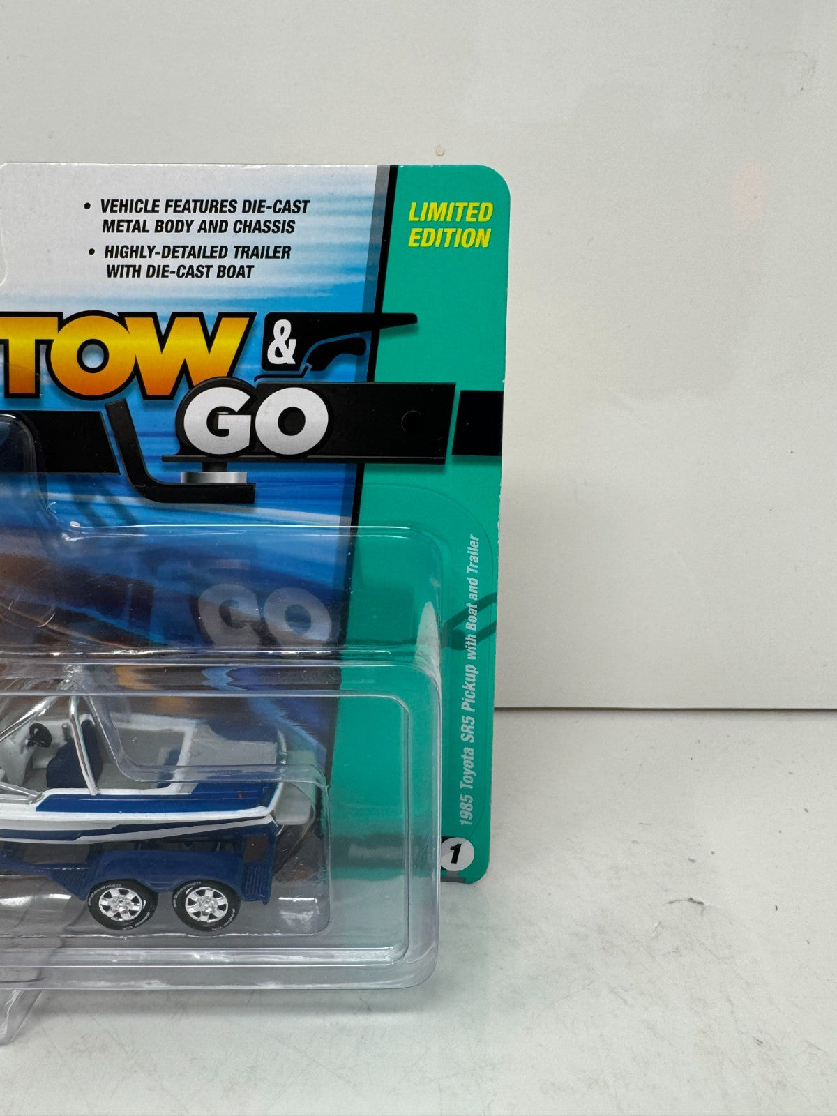 Johnny Lightning Tow & Go 1985 Toyota SR5 Pickup w/ Boat & Trailer 1:64 Diecast