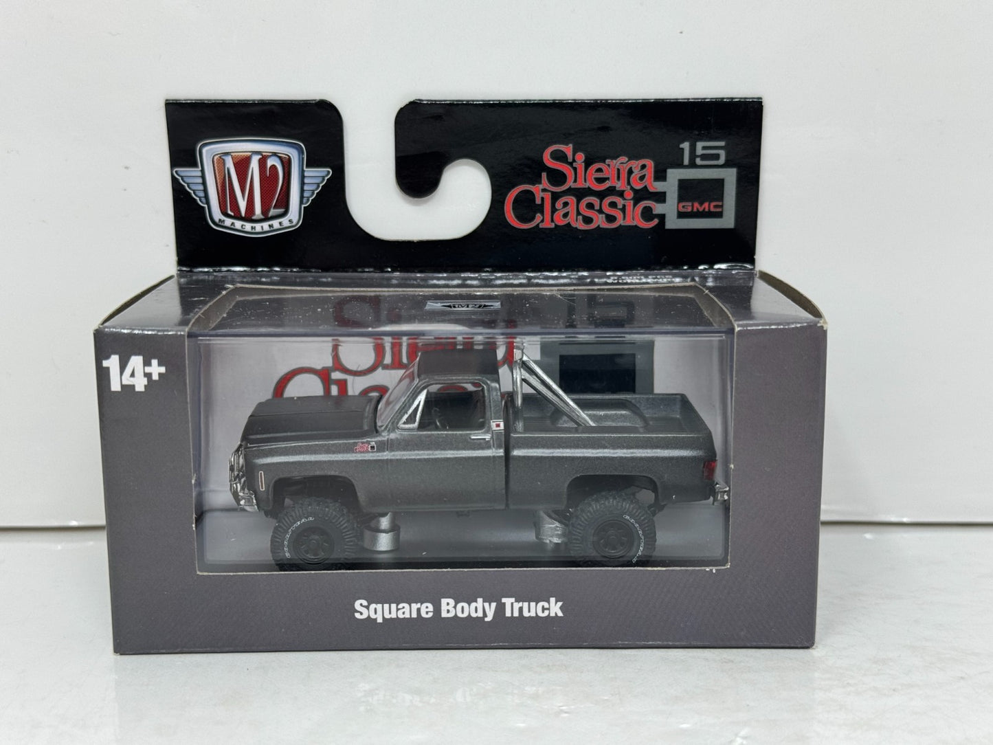 M2 Machines Square Body Truck 1976 GMC Sierra Grande 15 4x4 1:64 Diecast