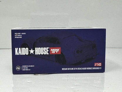 Kaido House Mini GT Nissan Skyline GT-R (R34) Kaido Works Shinjuku 1:64 Diecast