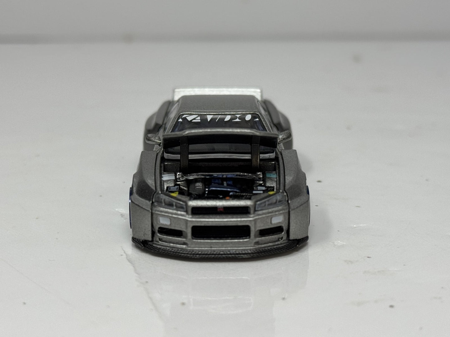 Kaido House Mini GT Nissan Skyline GT-R (R34) Kaido Works Shinjuku 1:64 Diecast