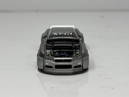 Kaido House Mini GT Nissan Skyline GT-R (R34) Kaido Works Shinjuku 1:64 Diecast