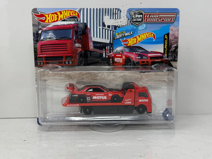 Hot Wheels Premium Team Transport #44 Nissan Skyline & Fleet Street 1:64 Diecast
