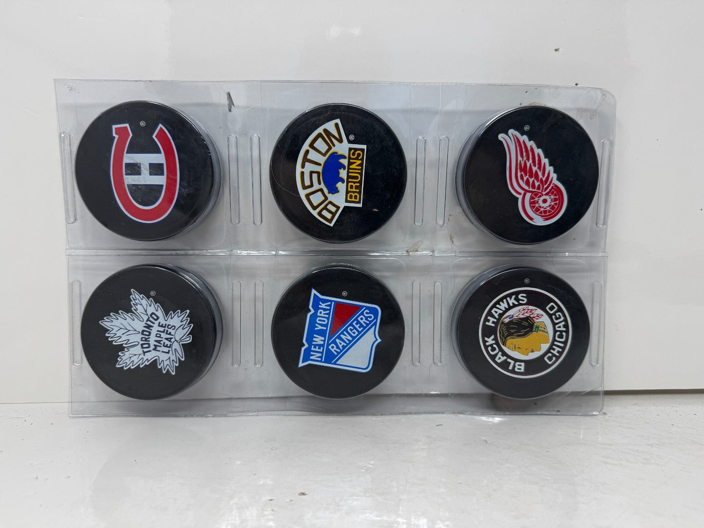 Original Six NHL Team Logo Hockey Puck Collection with Bonus Puck – 6 Teams