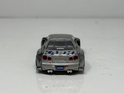 Kaido House Mini GT Nissan Skyline GT-R (R34) Kaido Works Shinjuku 1:64 Diecast