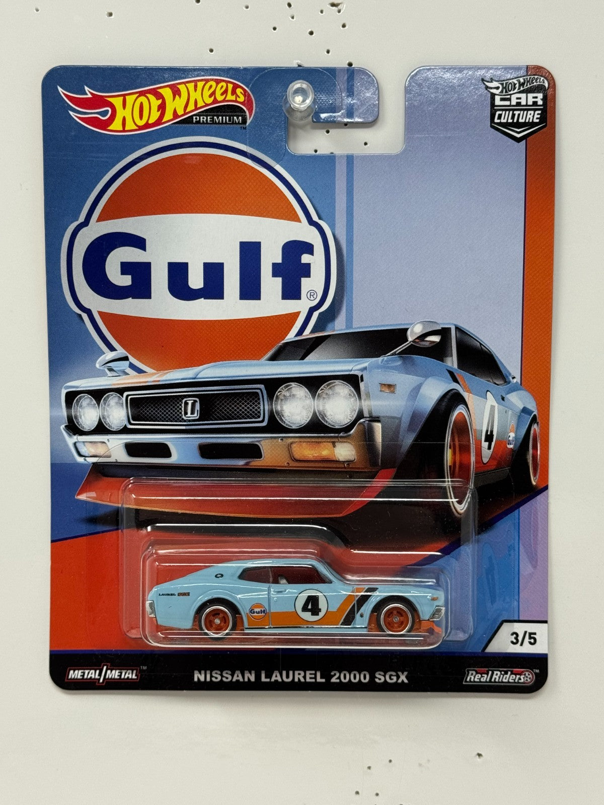 Hot Wheels Premium Gulf Nissan Laurel 2000 SGX 1:64 Diecast