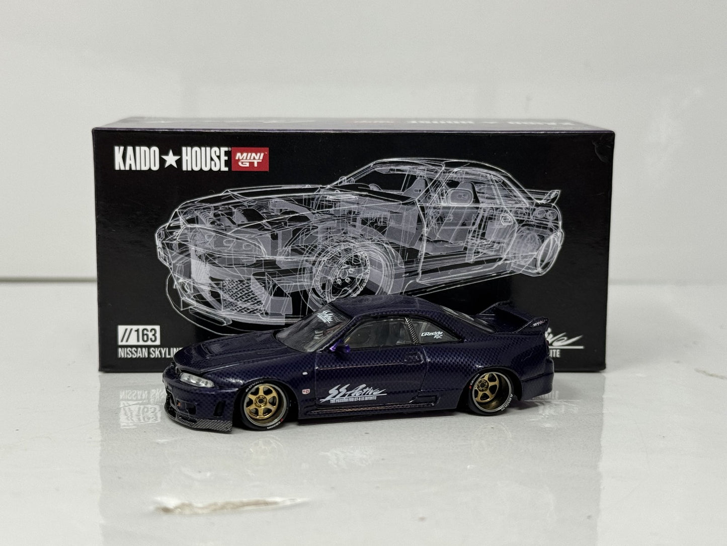 Kaido House MINI GT Nissan Skyline GT-R (R33) Active Carbon R V2 1:64 Diecast
