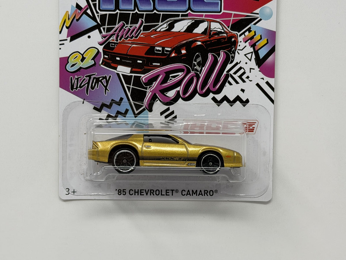 Hot Wheels 50th IROC and Roll 1985 Chevrolet Camaro IROC-Z 1:64 Diecast Gold