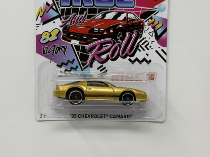 Hot Wheels 50th IROC and Roll 1985 Chevrolet Camaro IROC-Z 1:64 Diecast Gold