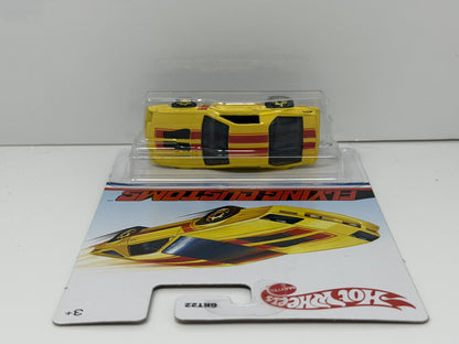 Hot Wheels Flying Customs 1985 Chevrolet Camaro IROC-Z 1:64 Diecast Yellow