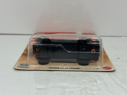 Matchbox Toyota Hilux Pickup 1:64 Diecast Orange