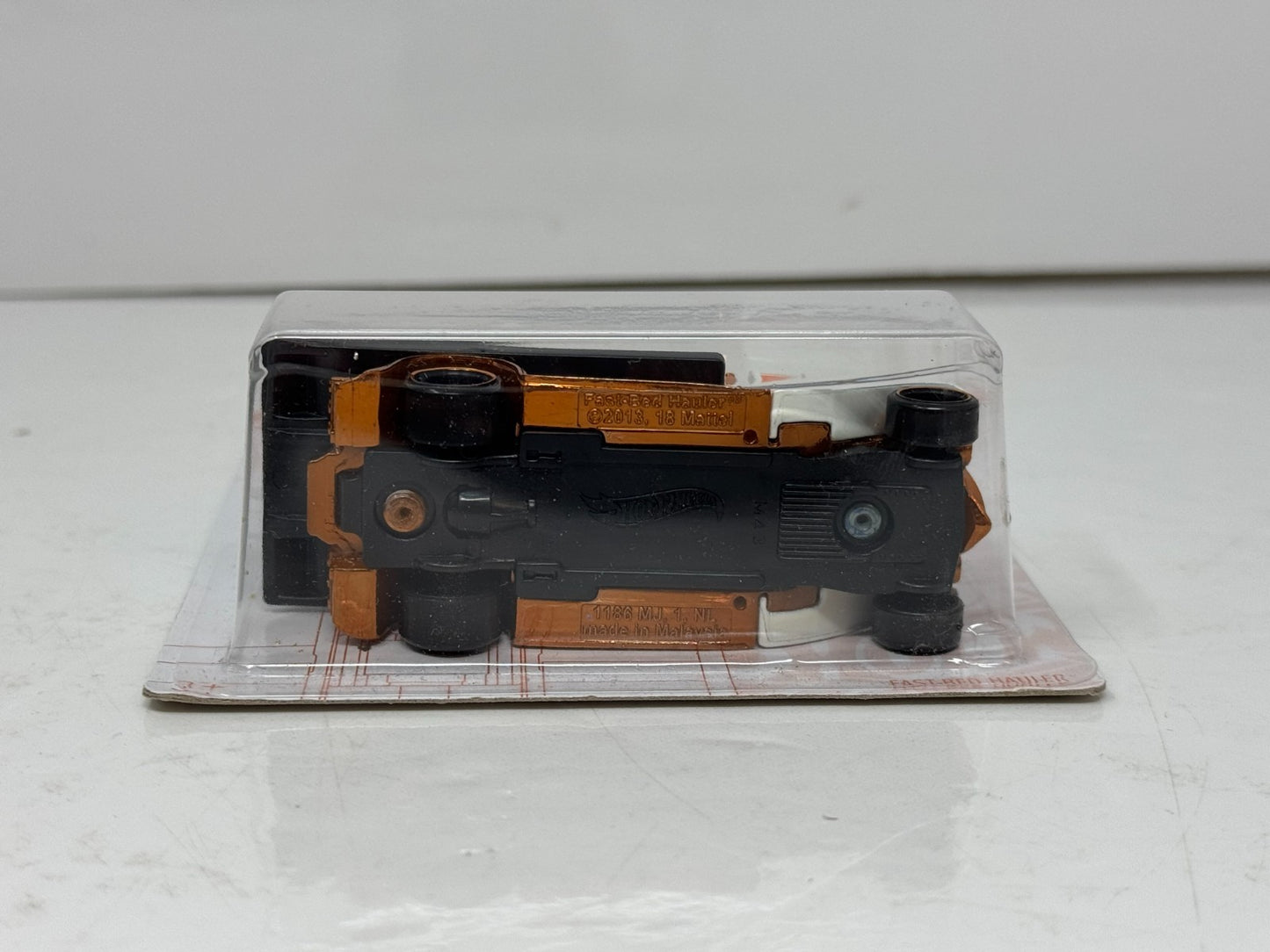 Hot Wheels White & Orange Fast-Bed Hauler 1:64 Diecast