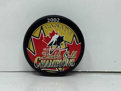Cheryl Pounder & Becky Kellar Team Canada Autograph Puck Gold Auto