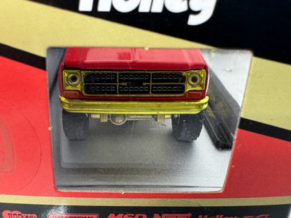 M2 Machines Holley 1976 GMC Sierra Grande 15 4x4 CHASE 1:64 Diecast