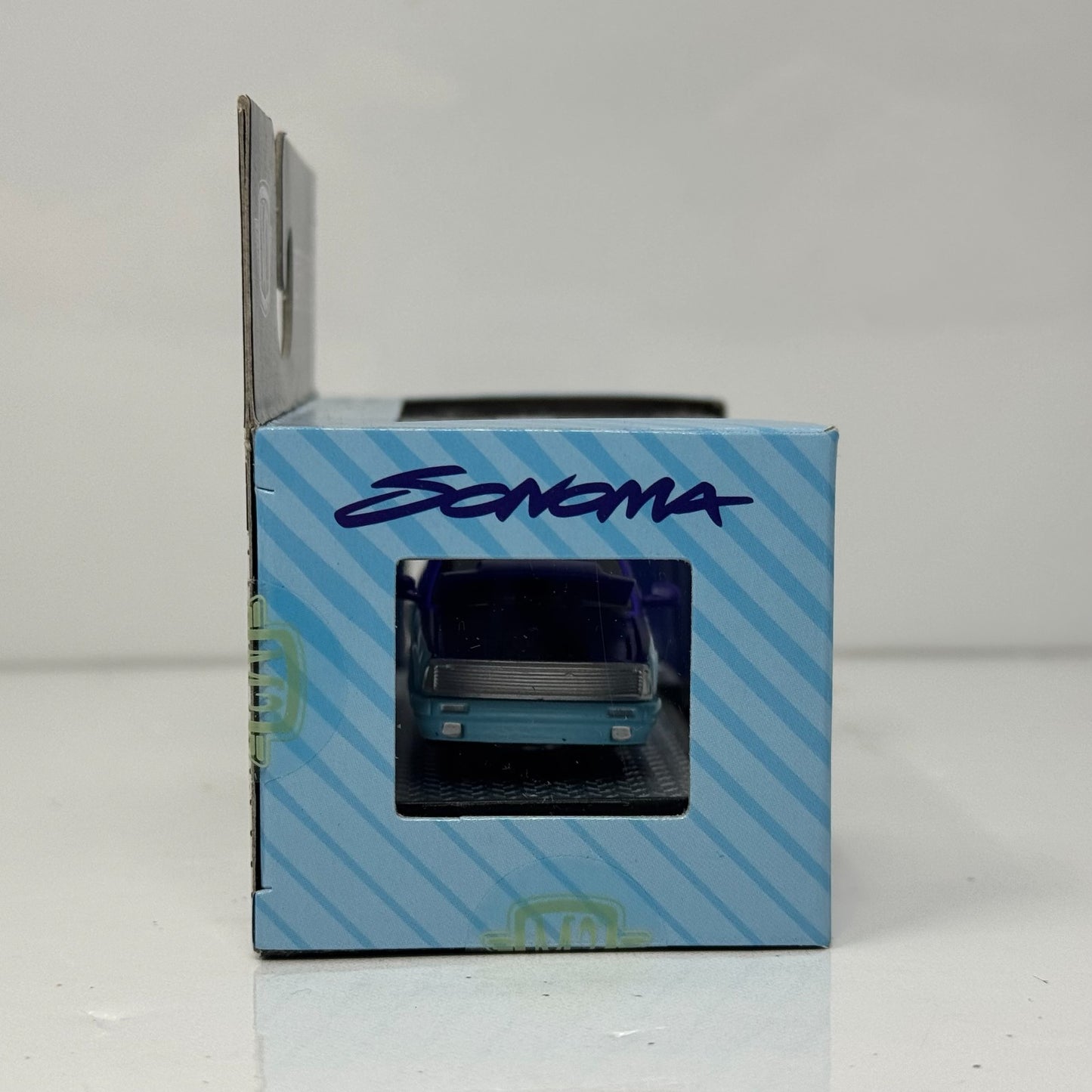 M2 Machines 1995 GMC Sonoma 15 Street Custom 1:64 Diecast