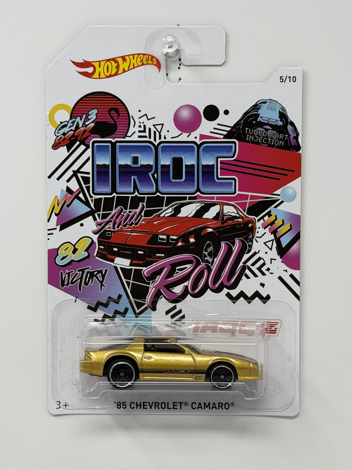 Hot Wheels 50th IROC and Roll 1985 Chevrolet Camaro IROC-Z 1:64 Diecast Gold
