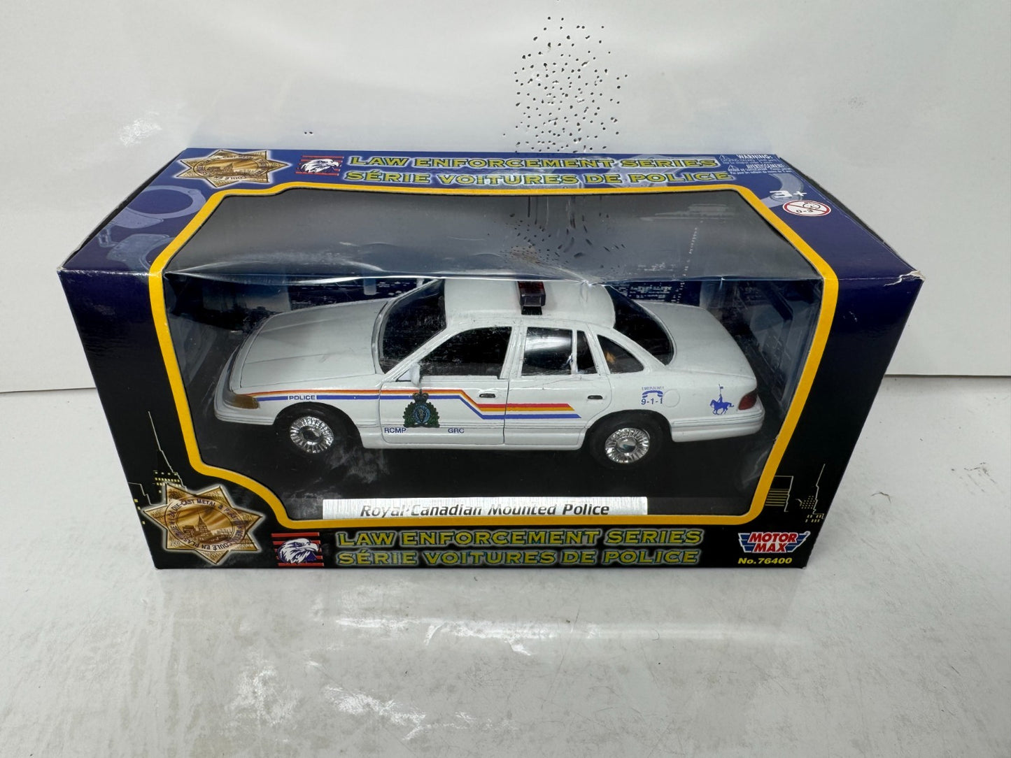 Motormax RCMP Ford Crown Victoria Police Car 1:24 Diecast Law Enforcement