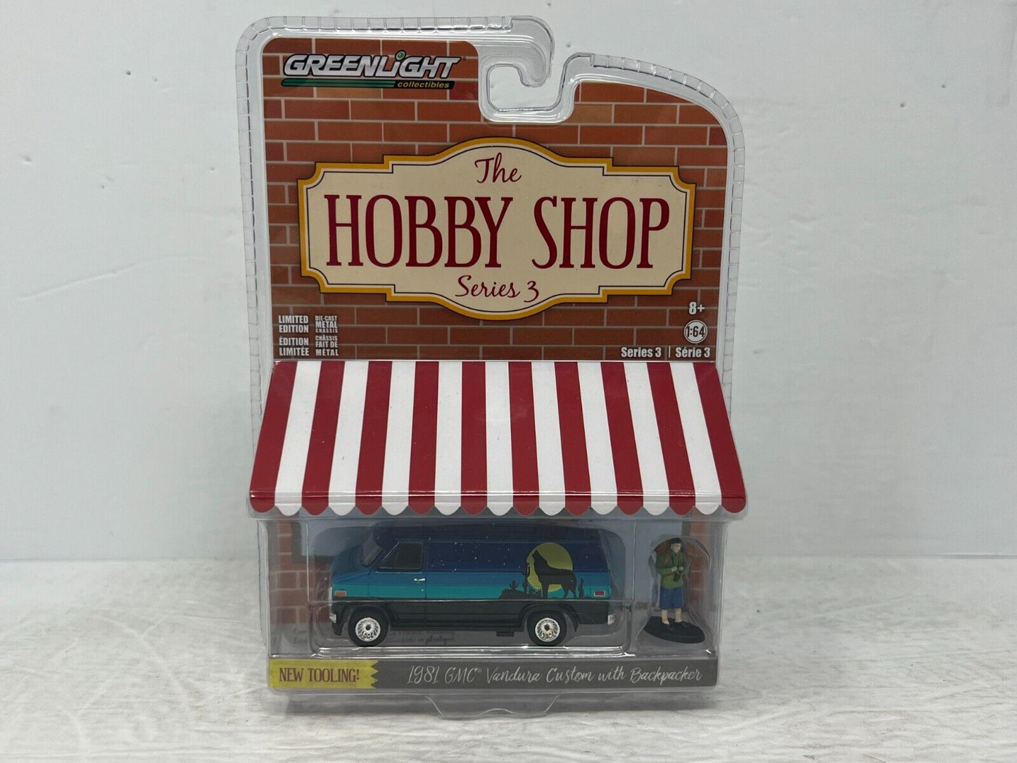 Greenlight The Hobby Shop 1981 GMC Vandura with Backpacker 1:64 Diecast