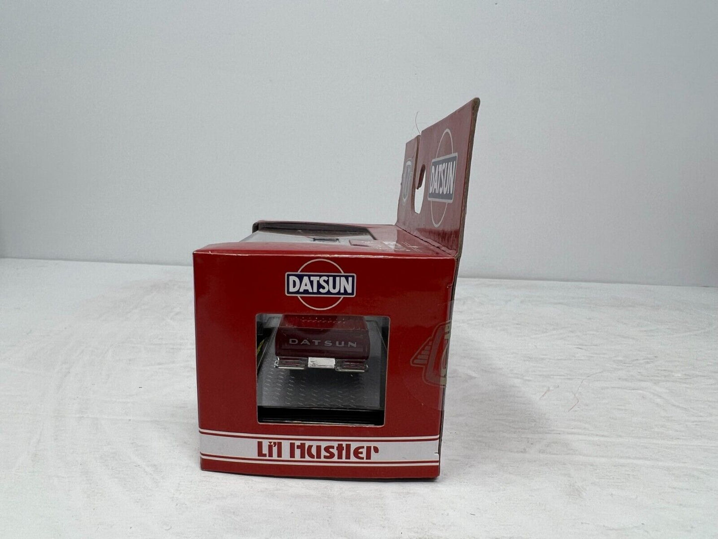 M2 Machines Li'l Hustler 1977 Datsun Pickup S89 1:64 Diecast