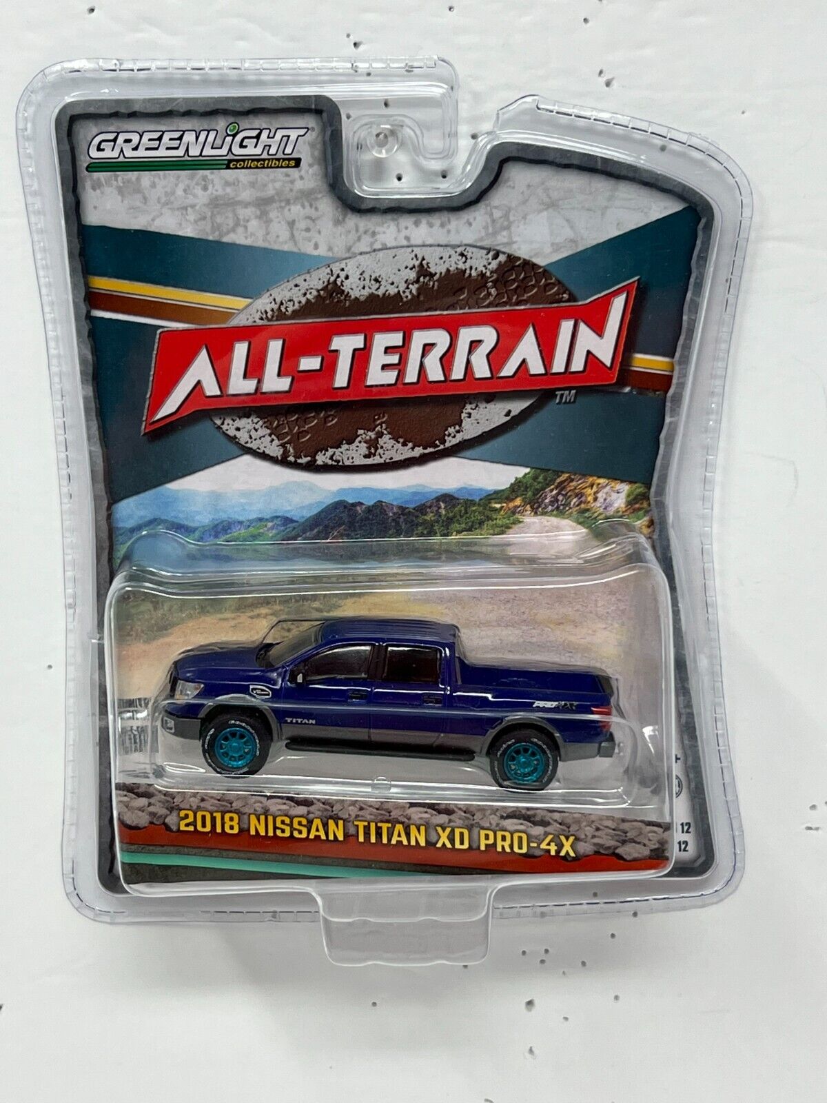 Greenlight All-Terrain 2018 Nissan Titan XD Pro-4X GREEN MACHINE 1:64 Diecast