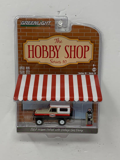 Greenlight The Hobby Shop 1967 Nissan Patrol w/ Vintage Gas Pump 1:64 Diecast